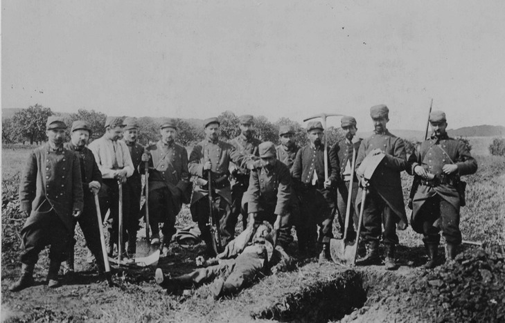 French soldiers burying German dead